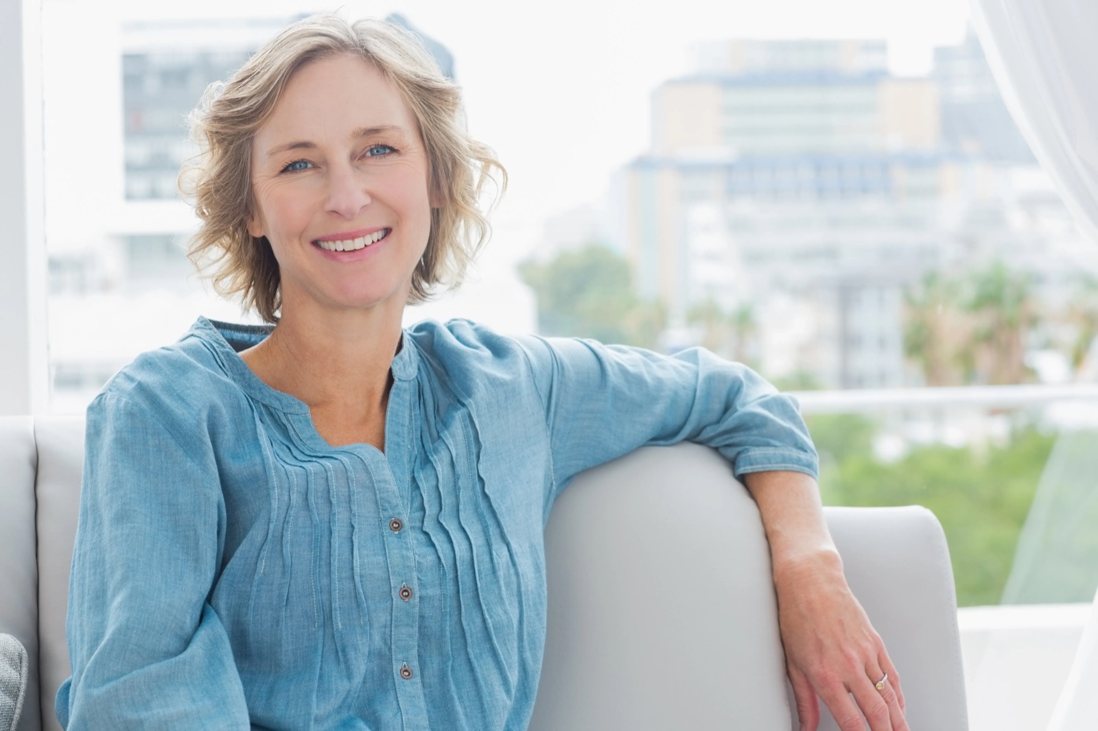 A relaxed patient portrait — wellness imagery from the Atlas Health Institute website